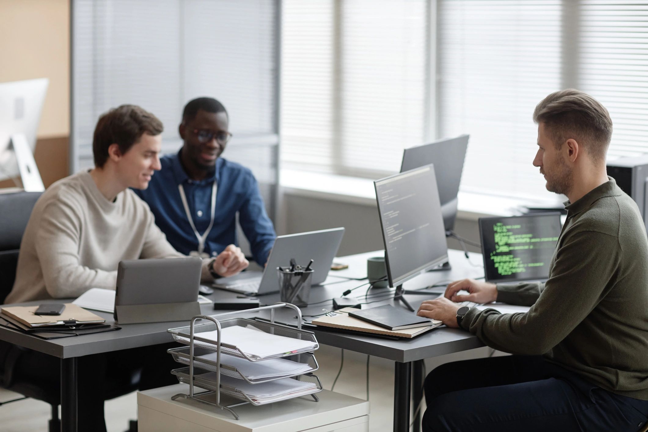 Software team working together in a modern office